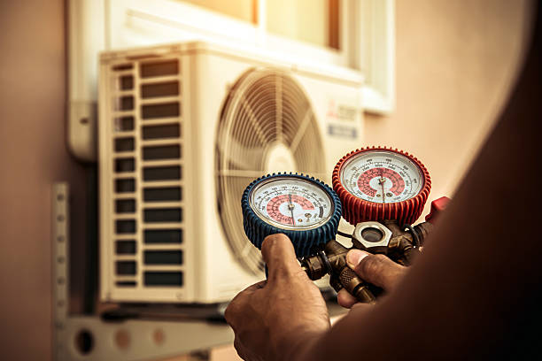 Professional Furnace Repair technician working in Upton, MA